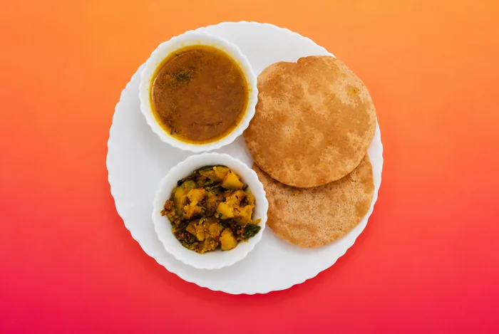 2 Fried Dal Poori with Sabji catering option